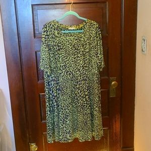 Casual knit dress with a black/purple/green leaf design